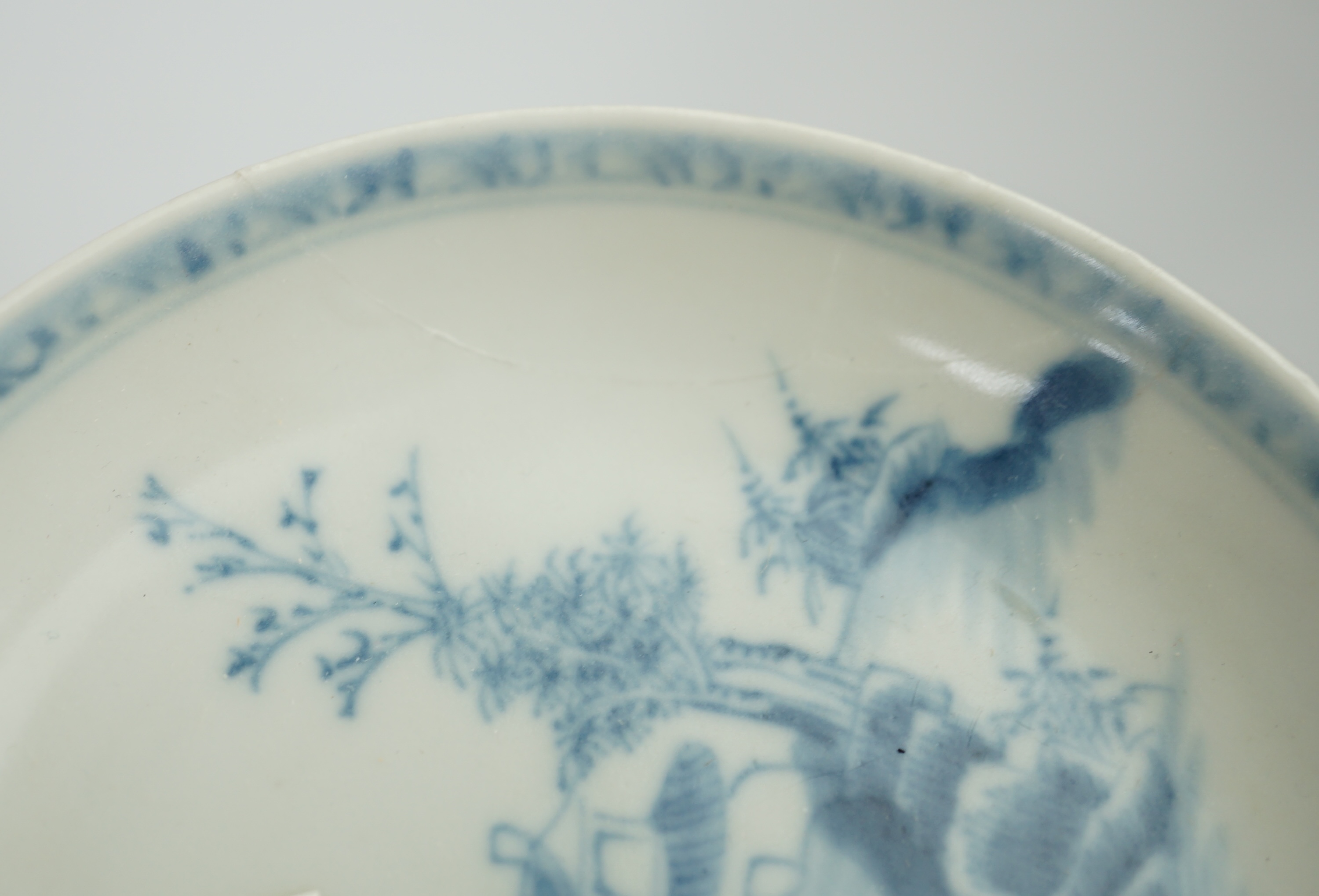 A set of twenty four Chinese Nanking Cargo blue and white ‘large pagoda’ tea bowls and saucers, Qianlong period